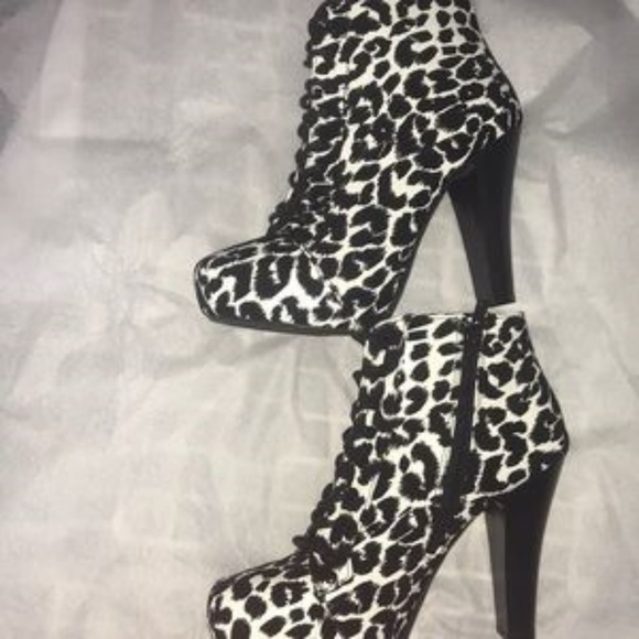 Charlotte Russe Shoes - ⬇$23 Charlotte Russe Lace up animal print booties